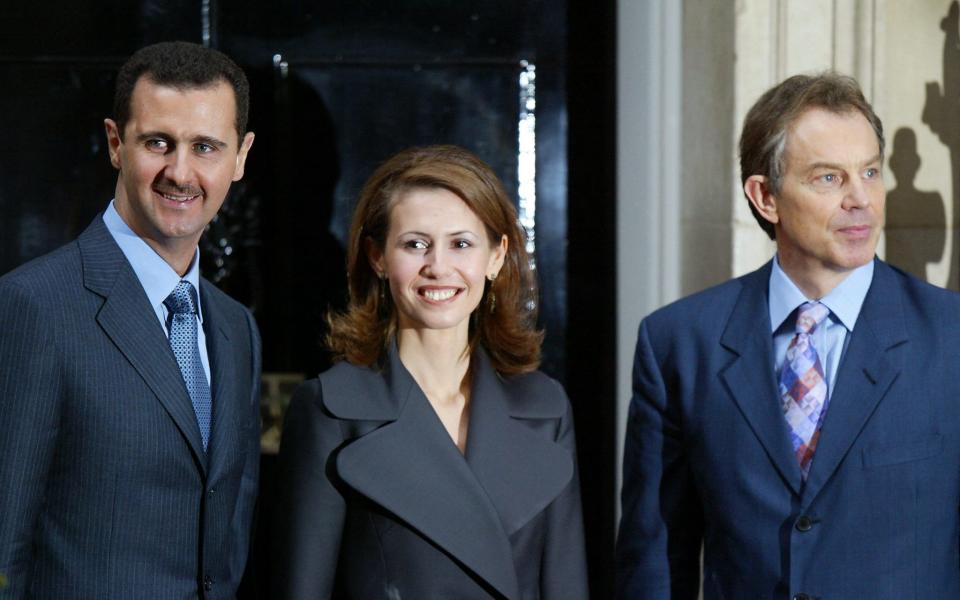 Assad and Asma with then prime minister Tony Blair in 2002