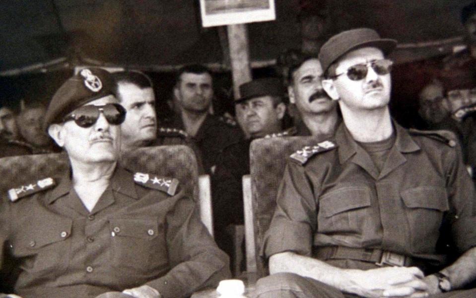 Assad in 2000 with army chief Ali Aslan