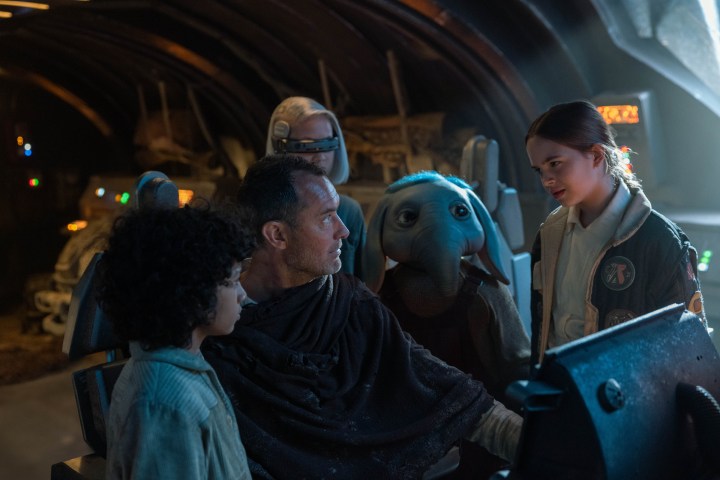 Jude Law sits in a starship's pilot seat in Star Wars: Skeleton Crew.