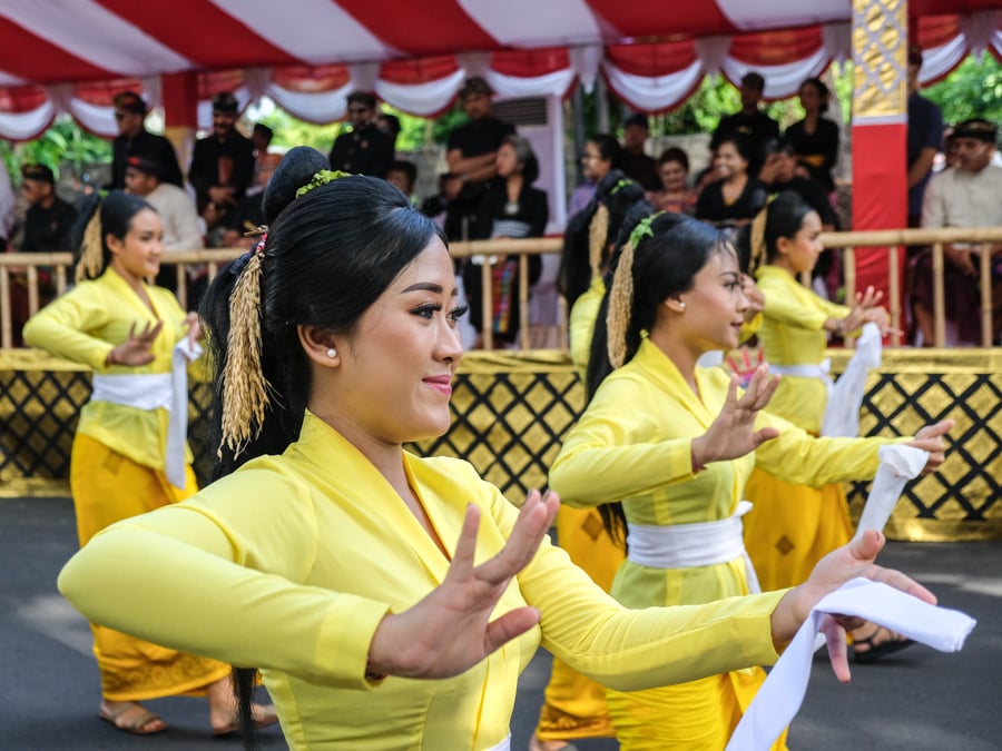 Balinese women dancing in a parade