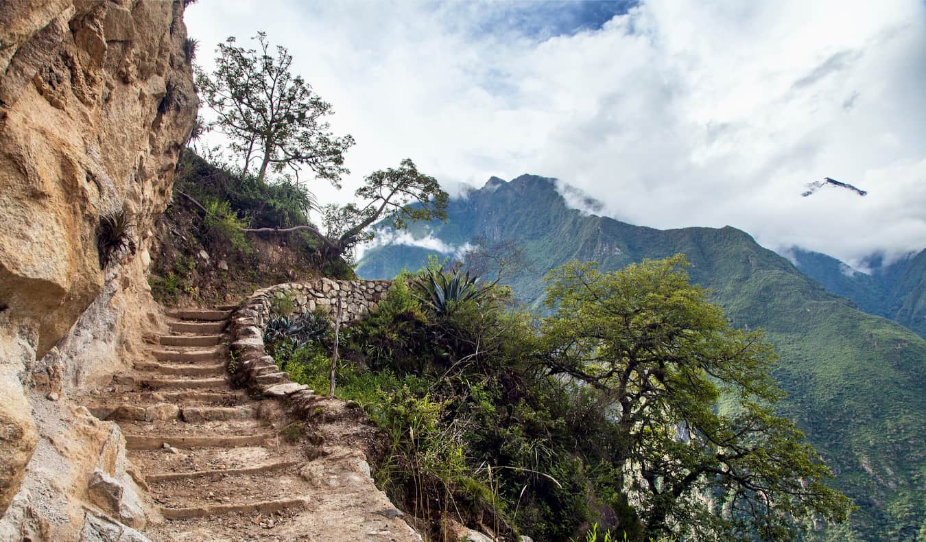 A narrow stairway built into the mountainside along the Choquequirao trek in Peru