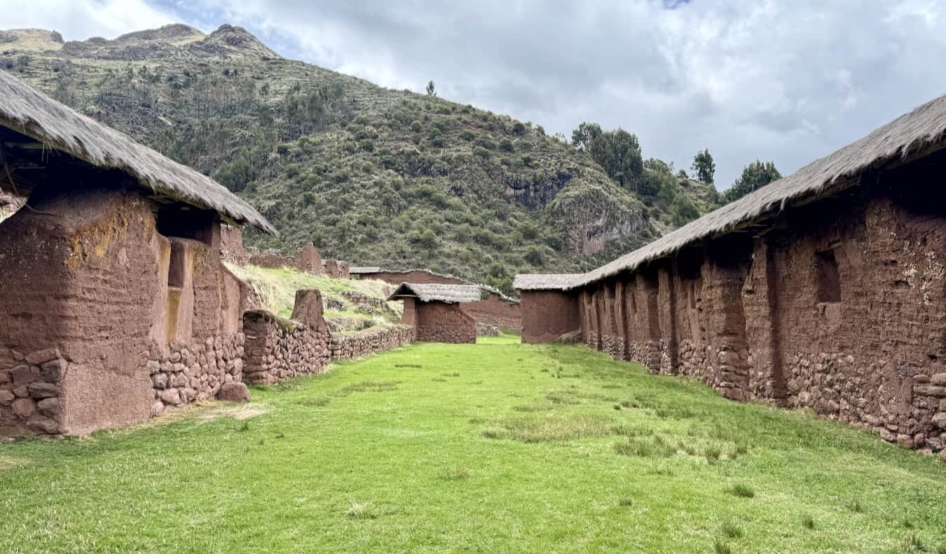 Old ruins of Inca in Hosoy Qosqo, Peru with a high hill in the background