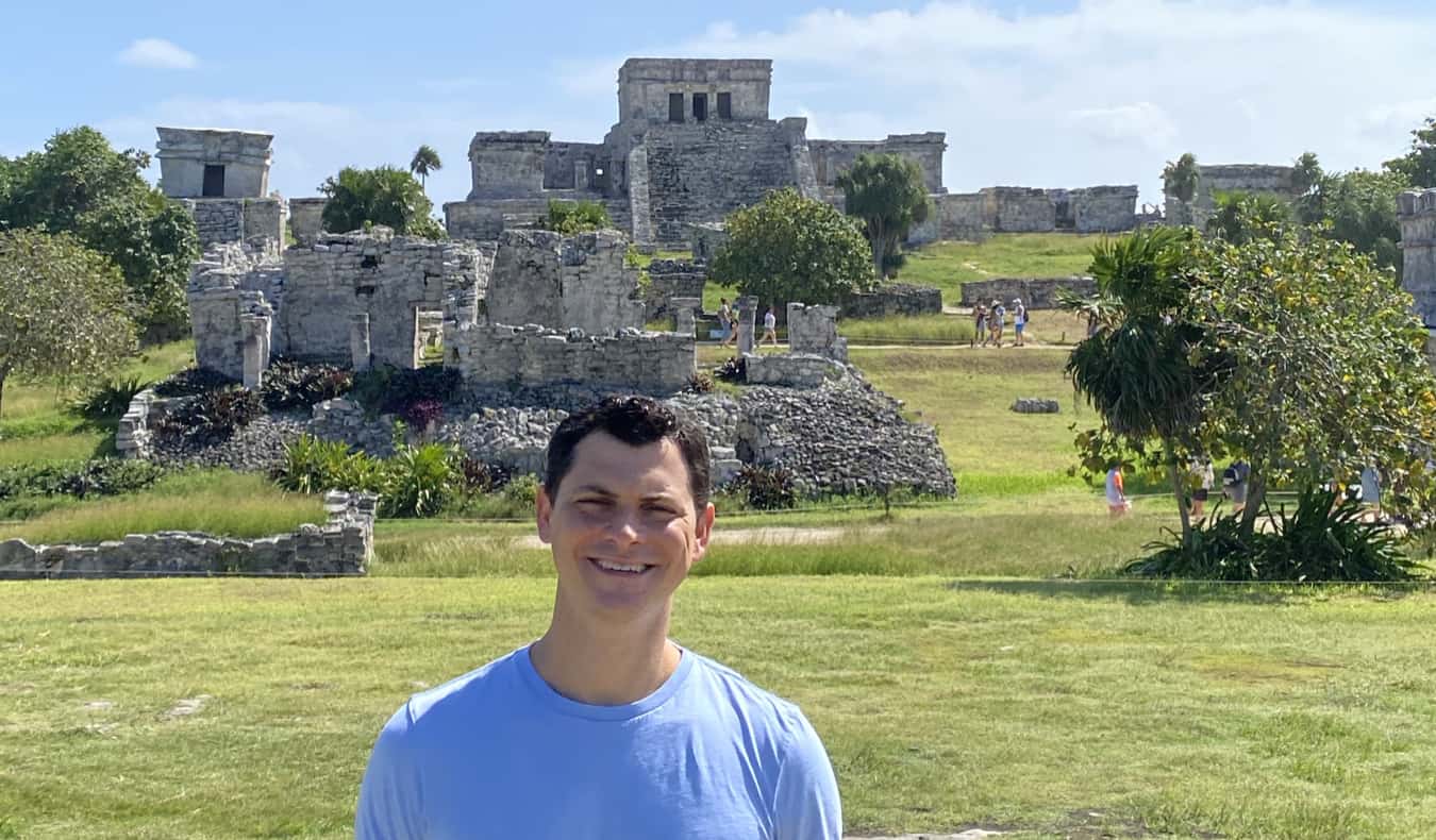 Bumadi Matt thinks near the rubble in Toulom, Mexico on a sunny day