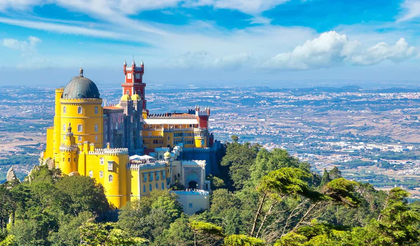 A colorful historical building in Portugal's rough hills