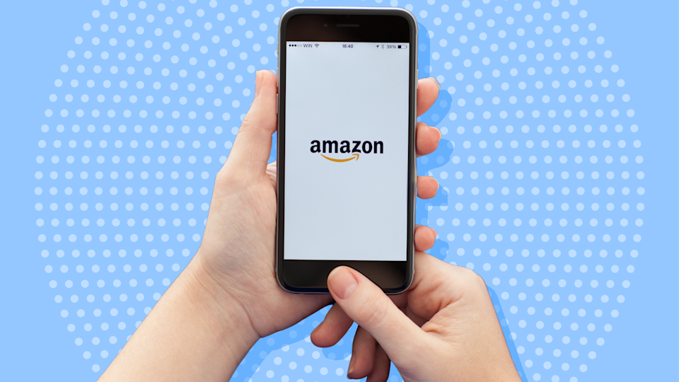 Someone holding a phone with the Amazon app pulled up, against a blue background