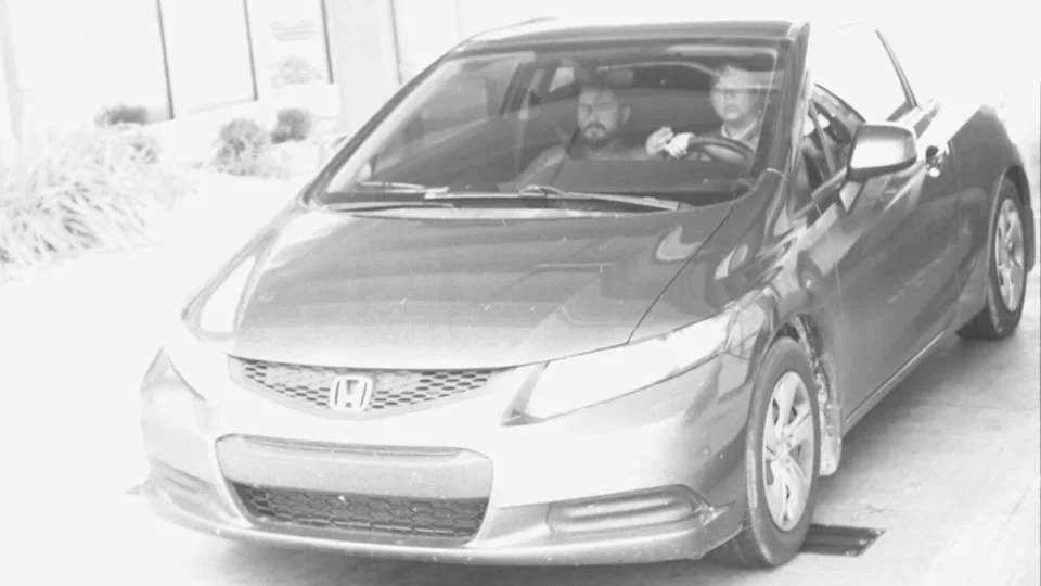 A toll booth surveillance photo from after the murder shows Christina Araujo, and not Zach Abell, driving the car. And therefore, Abell's attorney Alex Morris says, she was the one in control. / Credit: Franklin County Clerk of Court