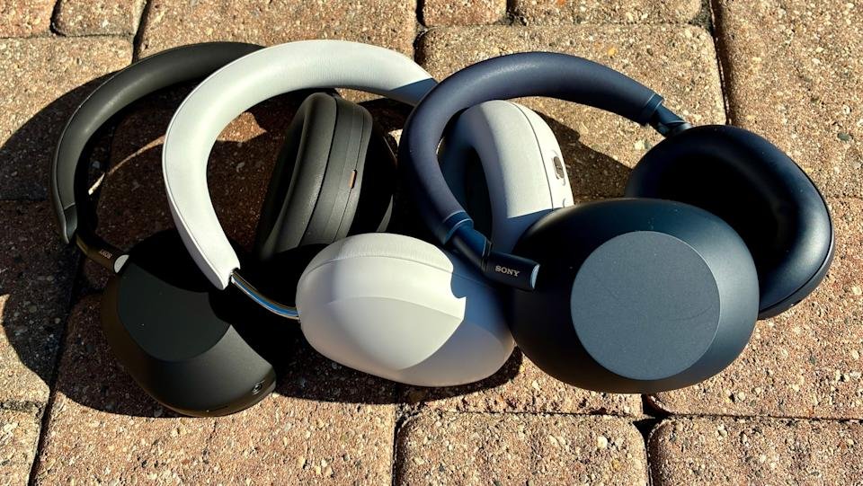 A photo showing the Sony XM6 (right), XM5 (left) and Sonos Ace (center).