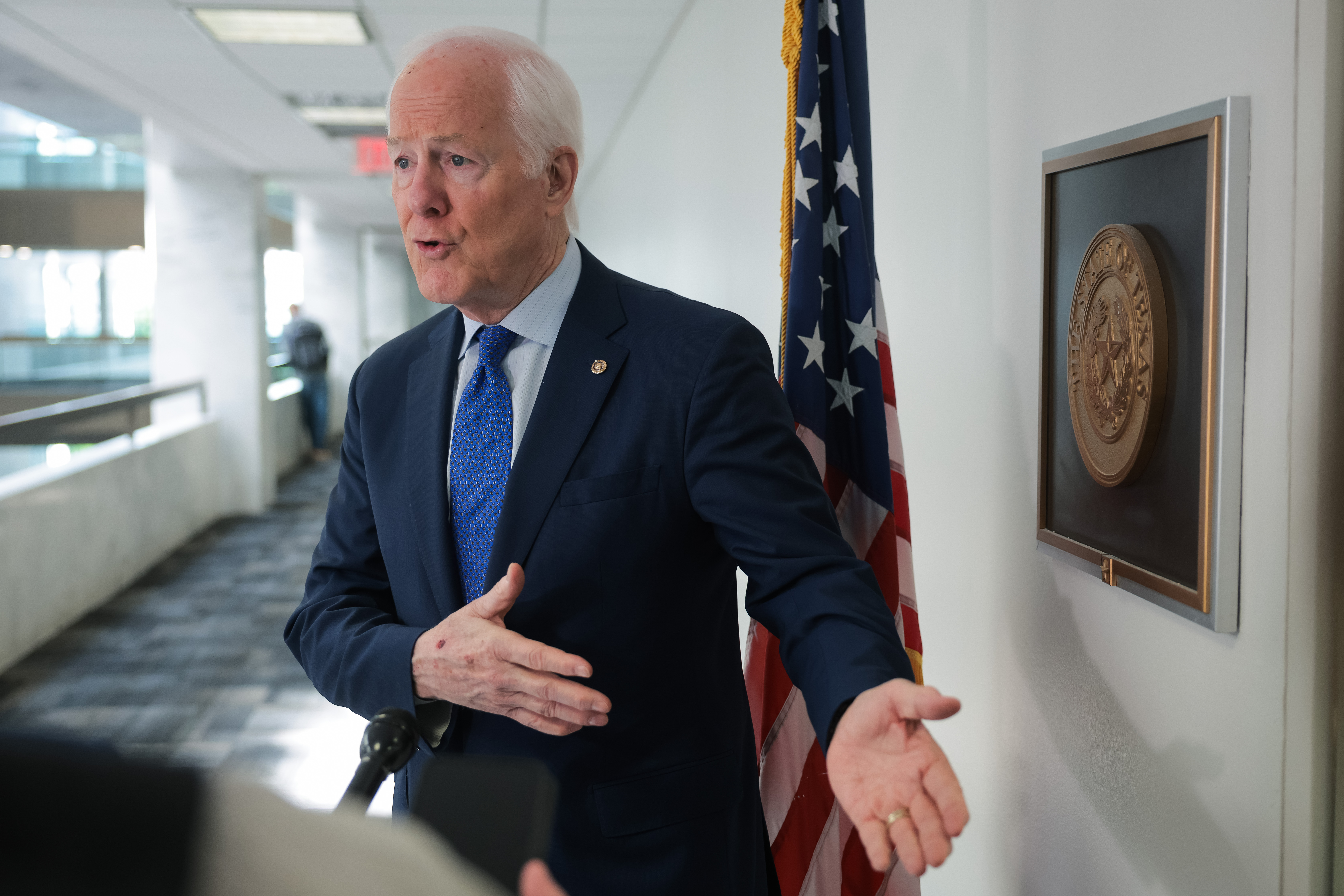Sen. John Cornyn (R-Texas) speaks to press outside of his office at the Hart Senate Office Building on April 28, 2025, in Washington.
