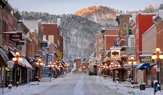 The snowy main street of the historic town of Deadwood, South Dakota