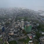 Motorcycle taxi drivers of Cameroon's Douala long for jobs and escape