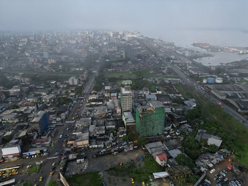 Motorcycle taxi drivers of Cameroon's Douala long for jobs and escape