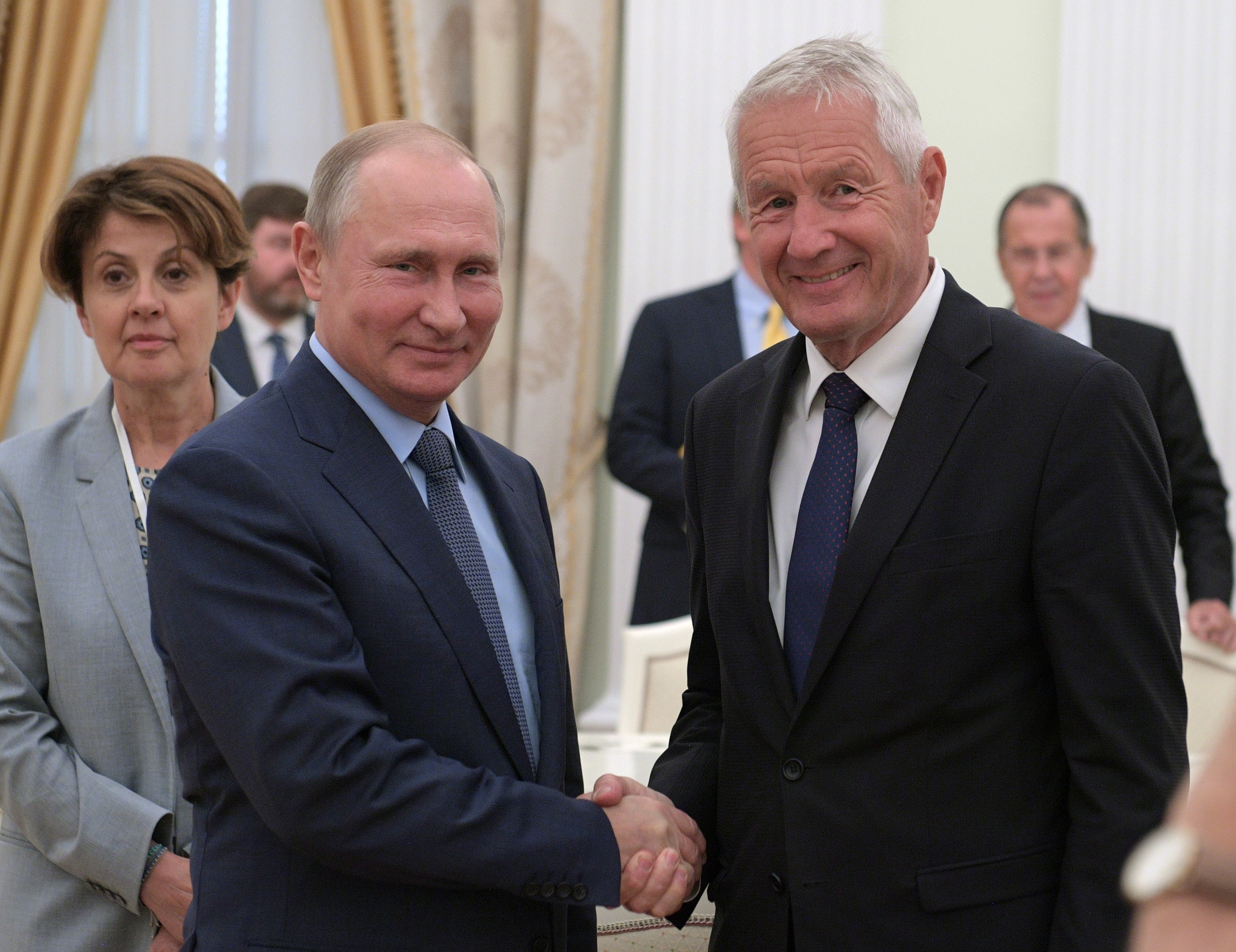 Russian President Vladimir Putin, left, shakes hands with Council of Europe Secretary General Thorbjorn Jagland during their meeting in the Kremlin in Moscow, Russia, Wednesday, June 20, 2018. (Alexei Druzhinin, Sputnik, Kremlin Pool Photo via AP)