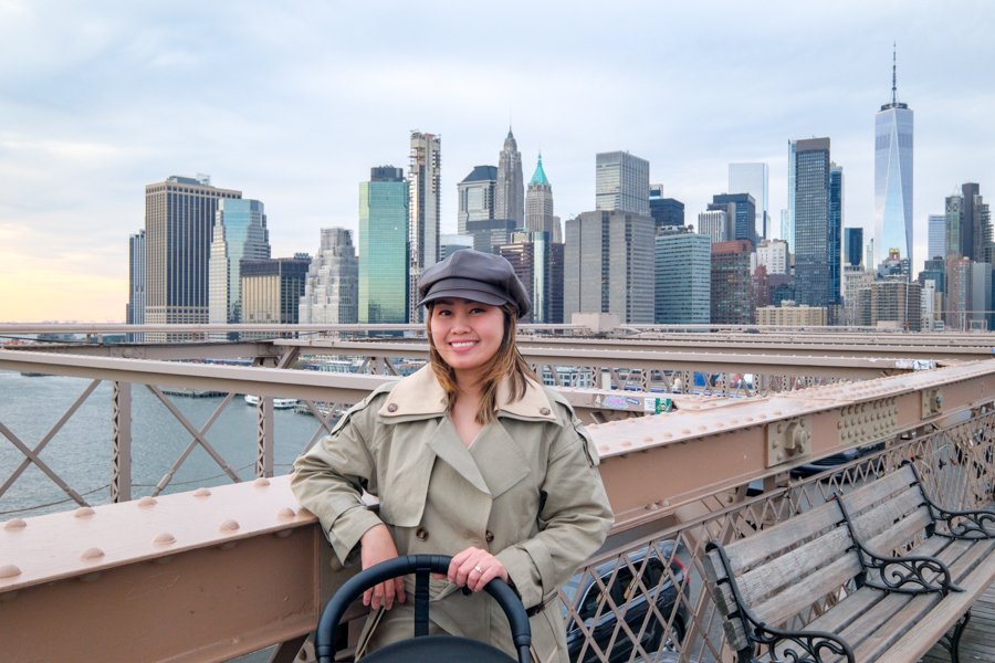 Posing on the Brooklyn Bridge with the Manhattan skyline