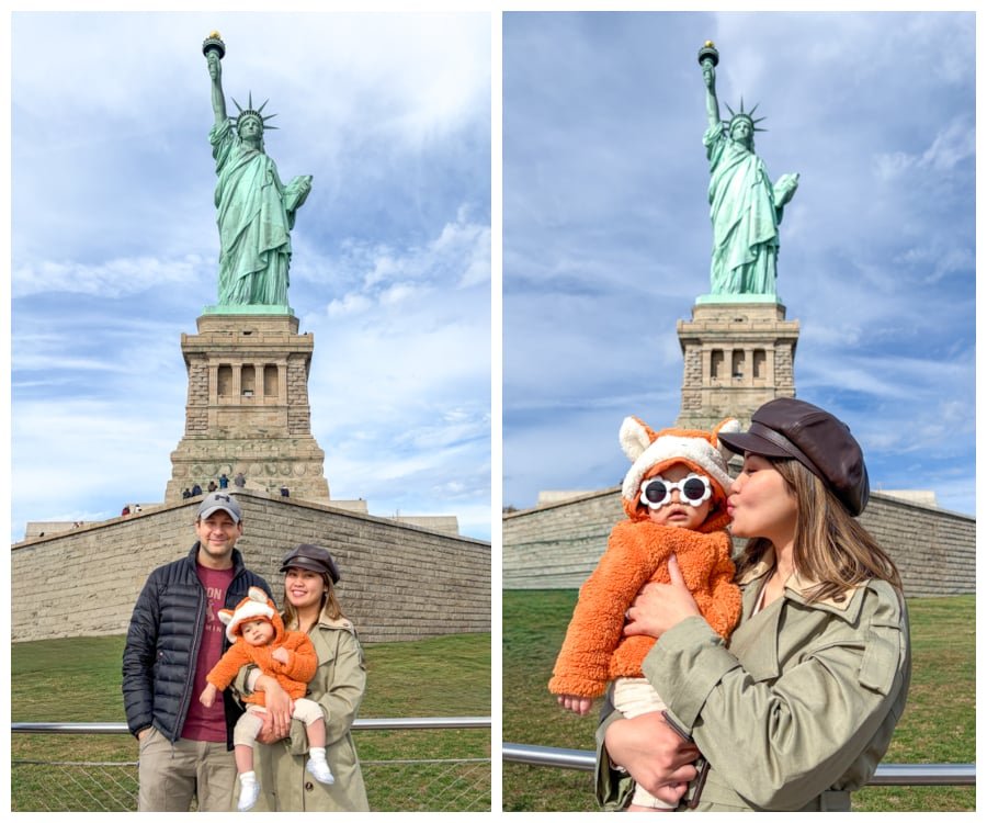 Posing with a child at the Statue of Liberty in New York City