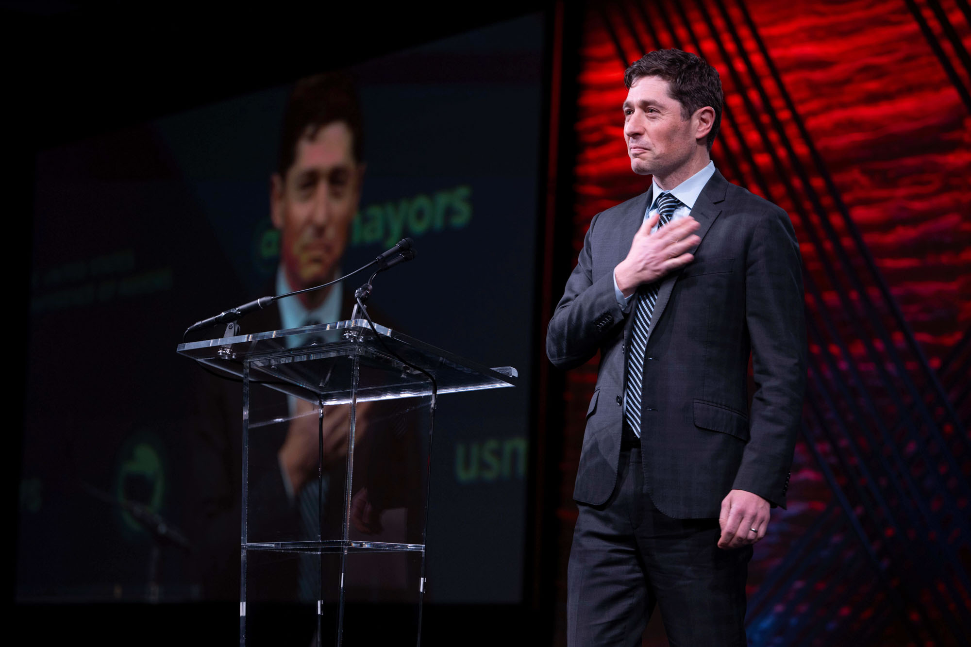 Minneapolis Mayor Jacob Frey acknowledges the applause as he steps to the podium to speak at the 94th Winter Meeting of the U.S. Conference of Mayors, Thursday, Jan. 29, 2026 in Washington.