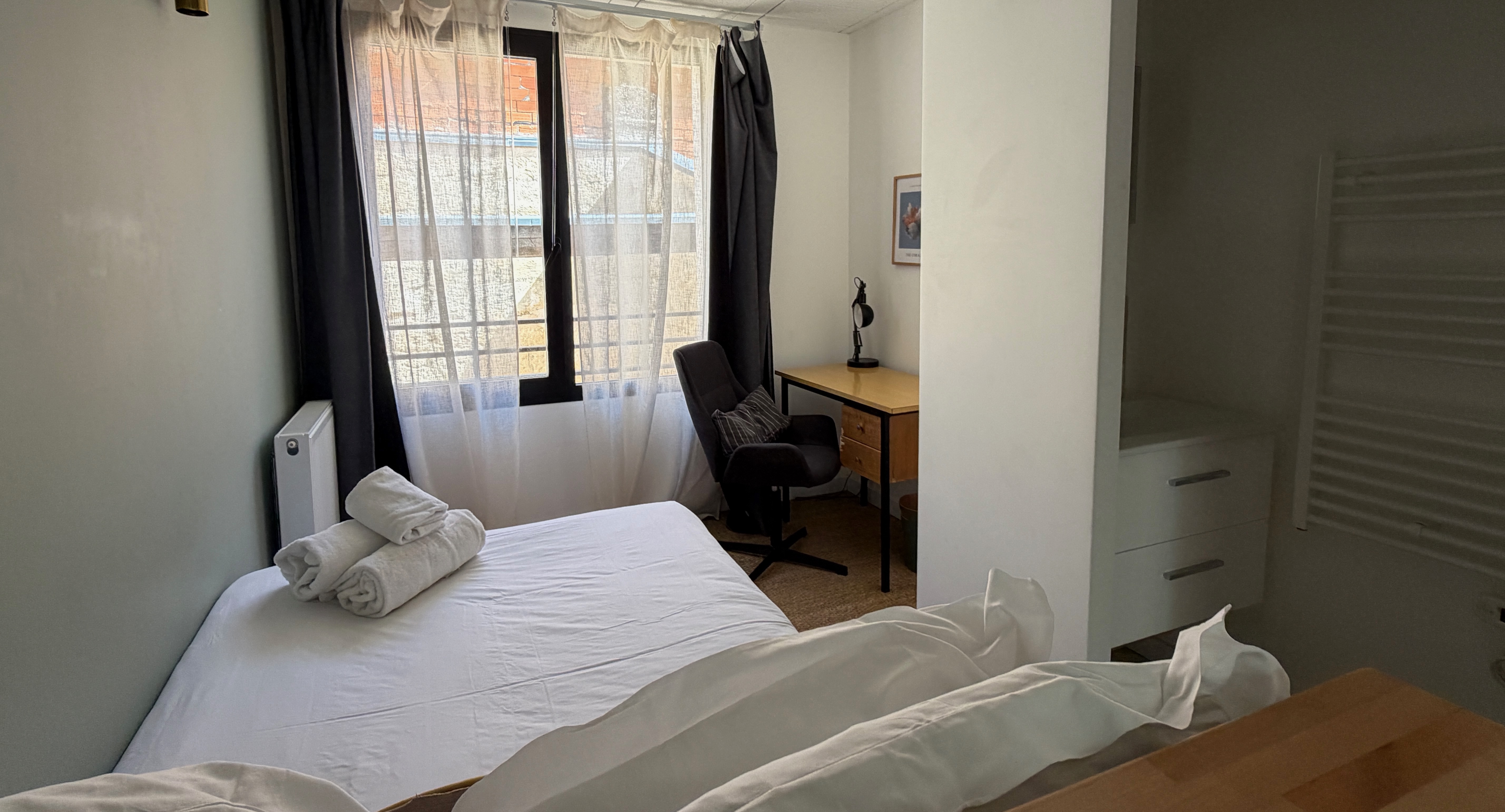 A bedroom in a remote workspace onsite in Bordeaux, France