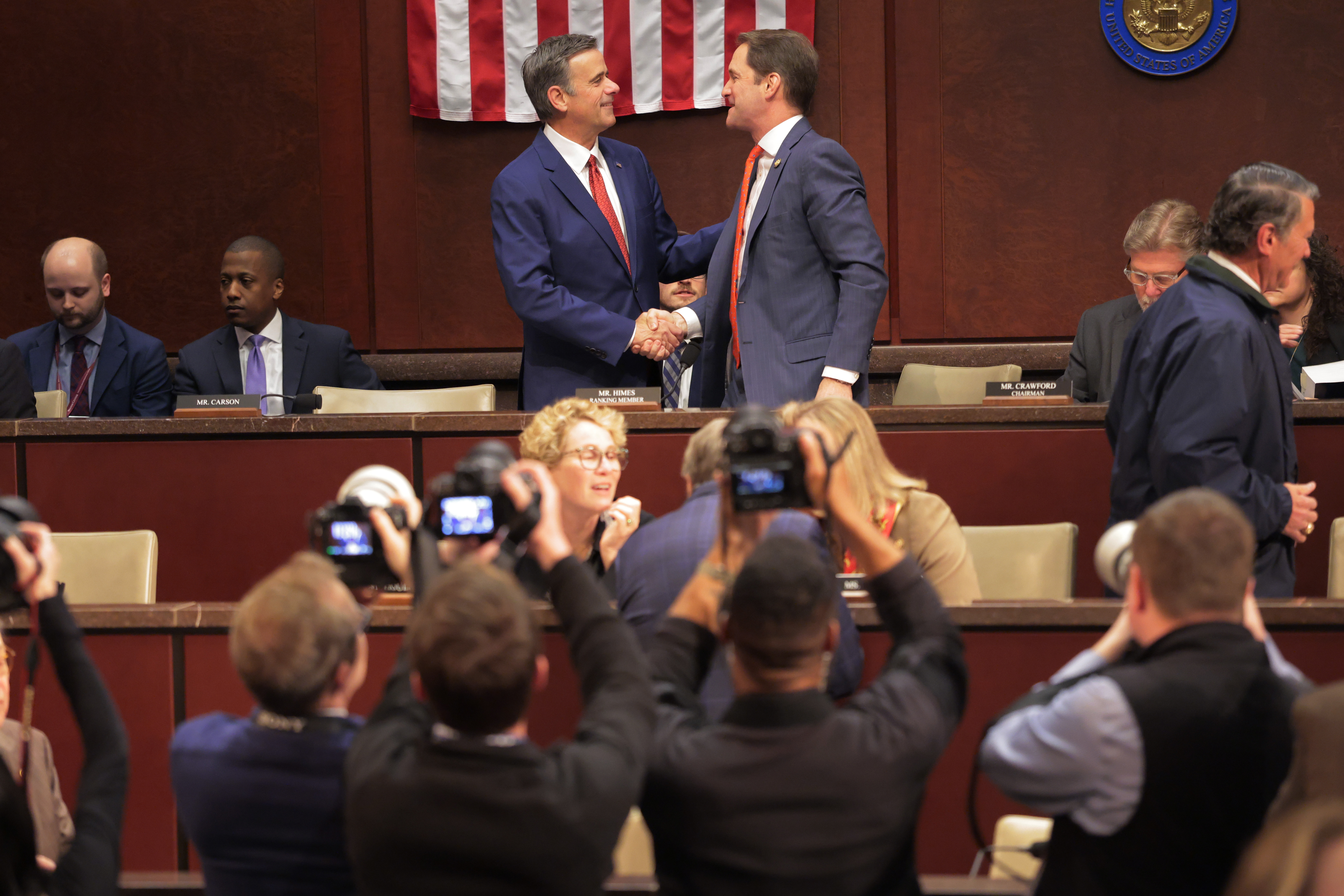 CIA Director John Ratcliffe, left, shakes hands with Himes during a House Select Intelligence Committee hearing in Washington to assess worldwide threats, March 19, 2026.