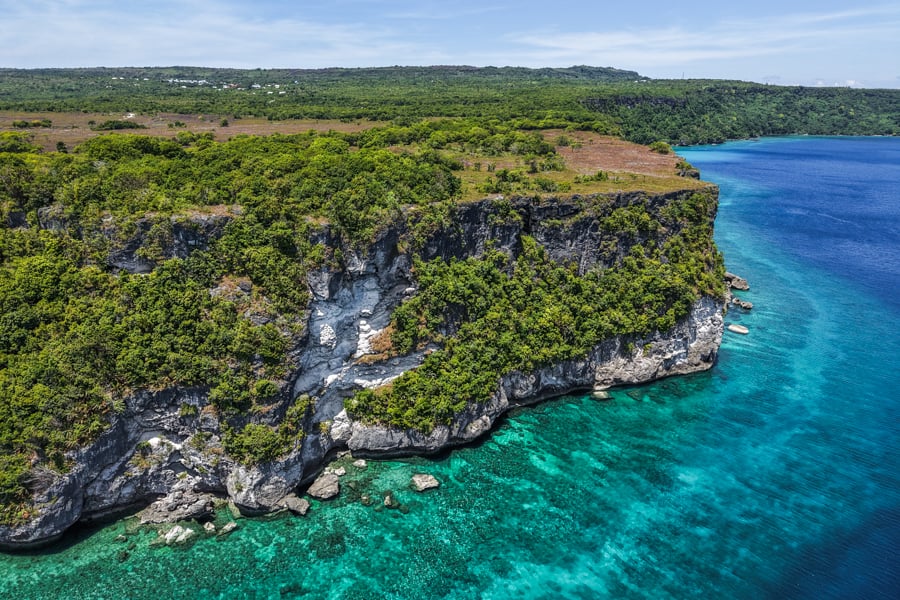 Drone pic of the steep cliffs at Siompu island