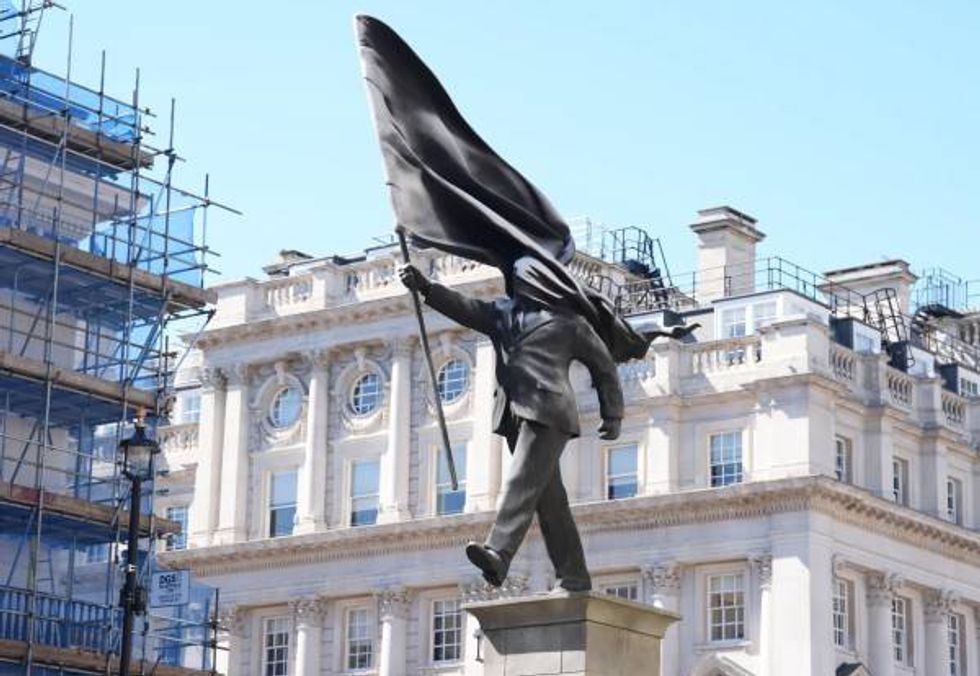 Banksy's new artwork of blind nationalism amidst the colonial ruins of London