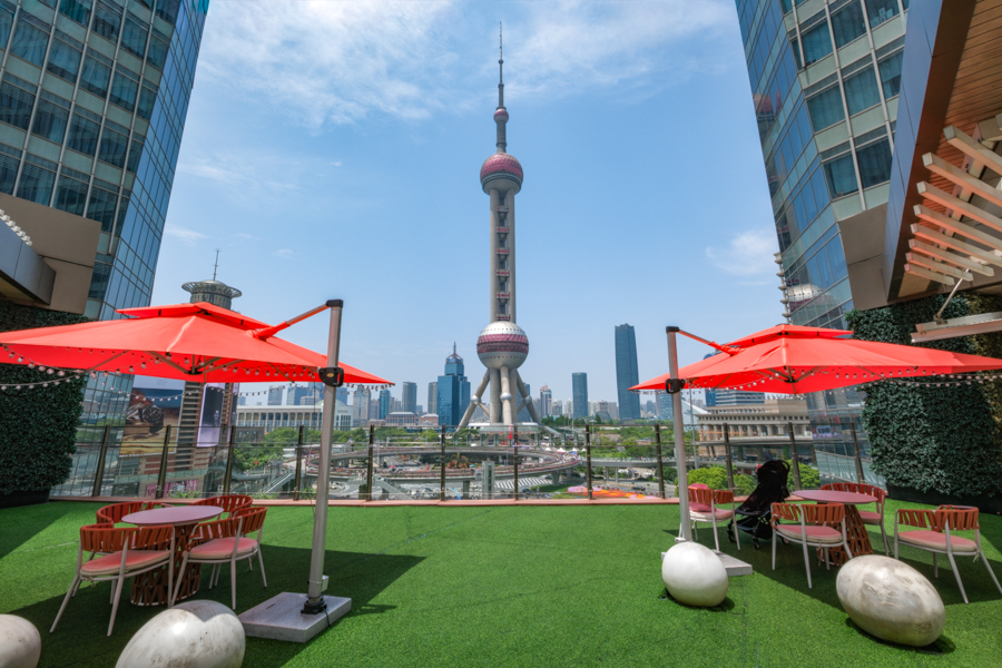 A rooftop view of the IFC Mall of the Oriental Pearl Tower in Shanghai, China