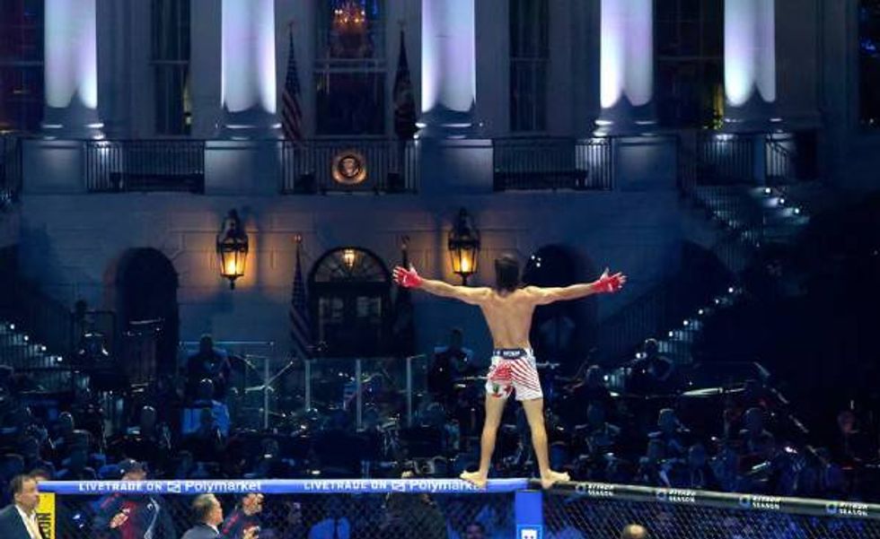 Diego Lopes celebrates defeating Steve Garcia in their featherweight bout. 