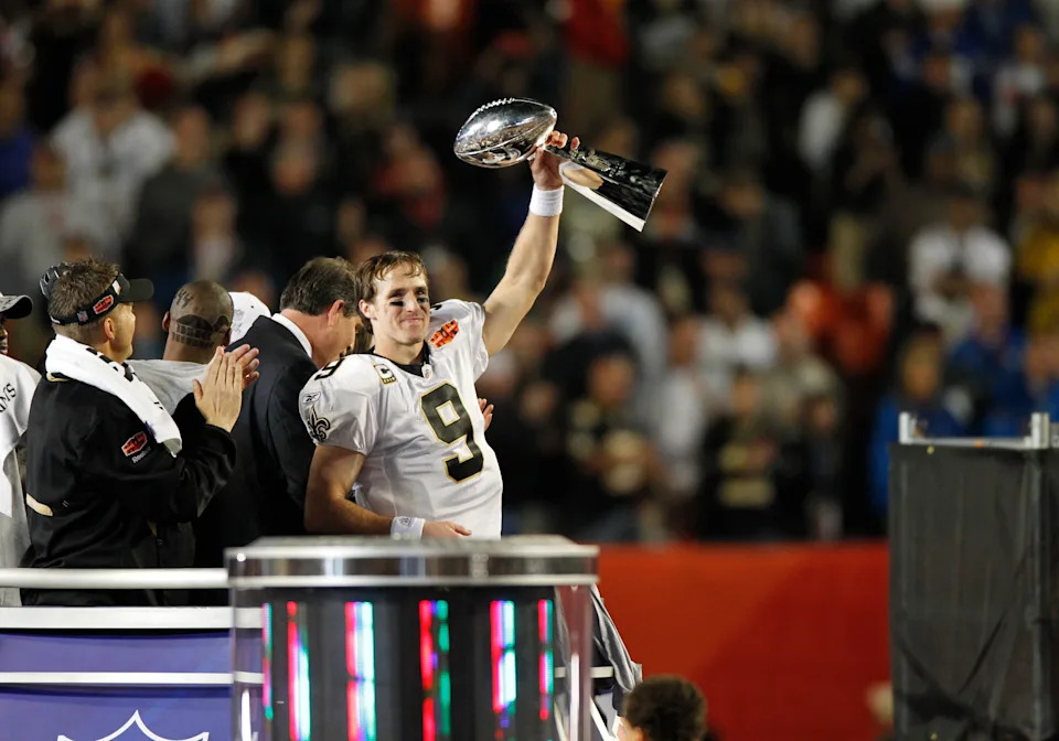 07 February 2010: New Orleans Saints quarterback Drew Brees holds up the Lombardi Trophy after the New Orleans Saints 31-17 victory over the Indianapolis Colts in Super Bowl XLIV at Sun Life Stadium in Miami, Florida. (Photo by Aaron M. Sprecher/Icon SMI/Icon Sport Media via Getty Images)