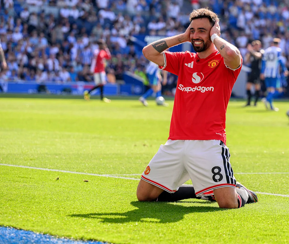 BRIGHTON, ENGLAND - MAY 24: Bruno Fernandes celebrates scoring his side's third goal during the Premier League match between Brighton & Hove Albion and Manchester United. (Photo by David Horton - CameraSport via Getty Images)