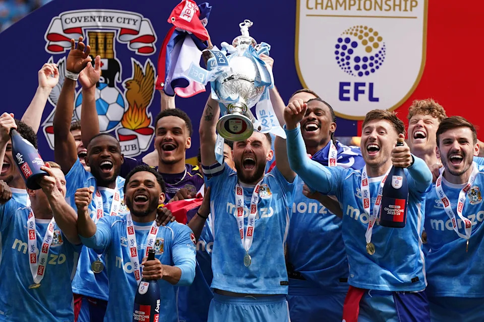 Coventry City's captain Matt Grimes and his team mates lift the Sky Bet Championship trophy. (Photo by Jacob King/PA Images via Getty Images)
