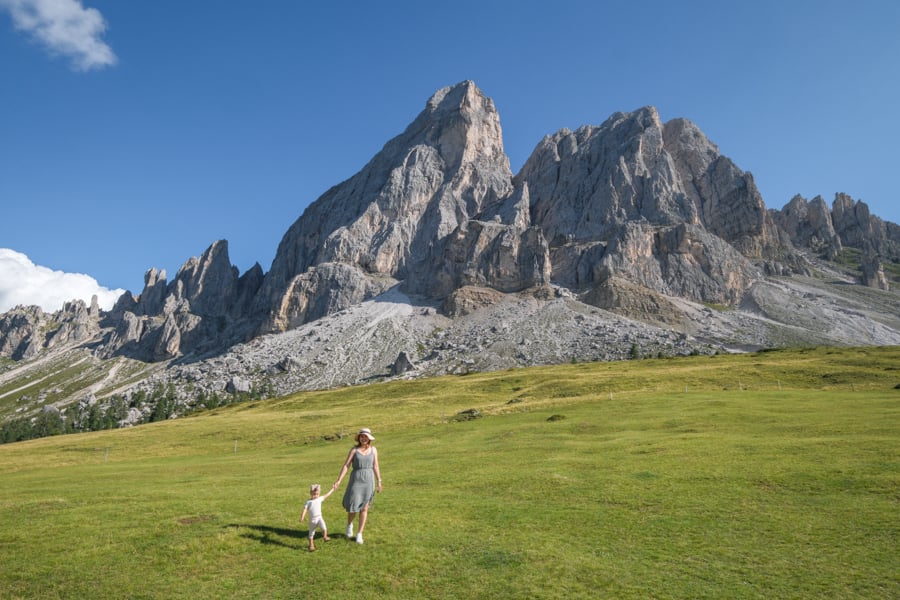 Mother and baby walking at Peitlerkofel