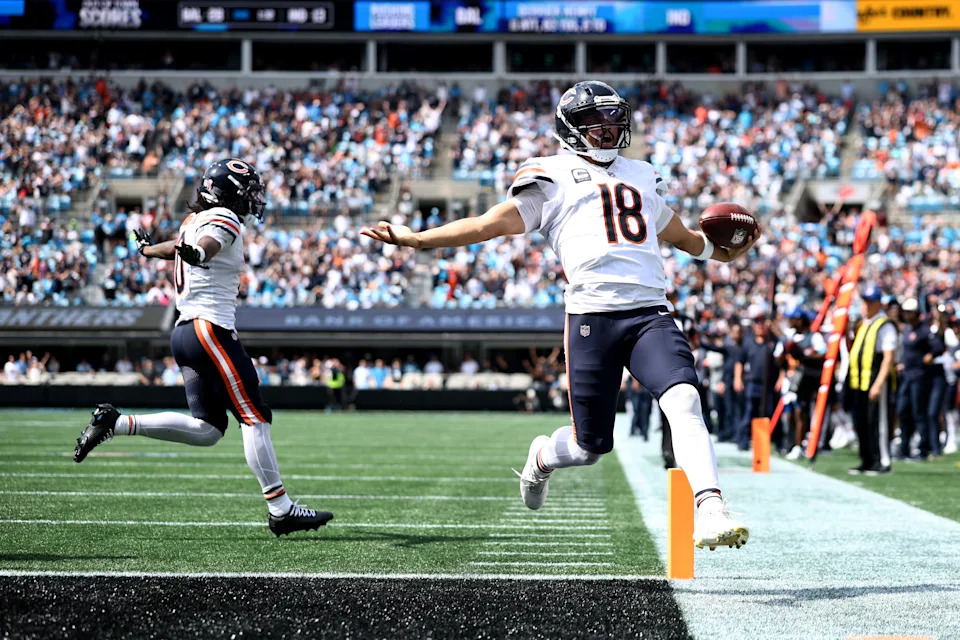 Caleb Williams of the Chicago Bears celebrates after scoring a touchdown against the Panthers. (Photo by Jared C. Tilton/Getty Images)